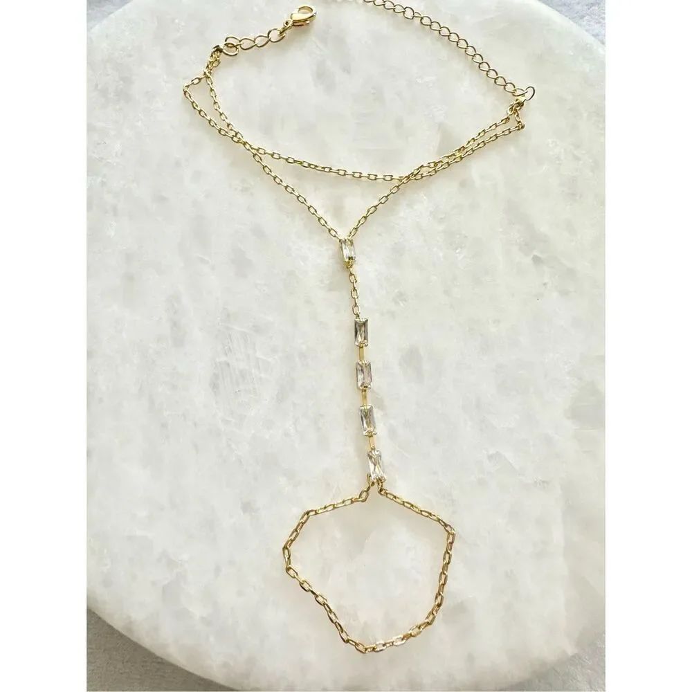 Cubic zirconia elongated radiant cut gold finger chain link bracelet ￼